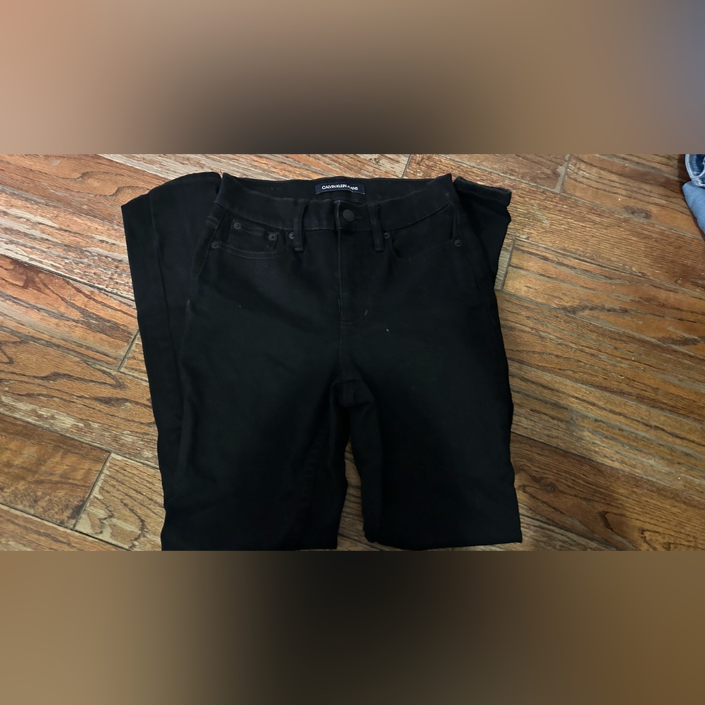 Calvin Klein Black “jegging” skinny jeans, size 25. New! No damages!